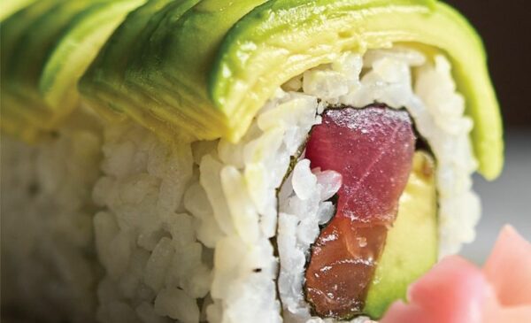 A Sushi Platter and a Glass of Wine at Urchin Restaurant - Image 5