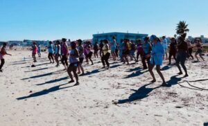 Enjoy a Silent Disco Zumba Class on Sunset Beach