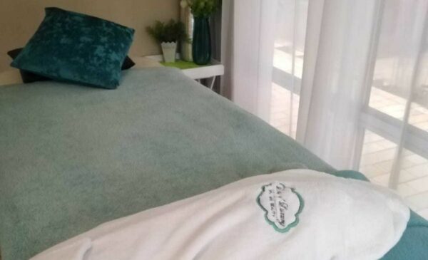 A Hot Stone Massage and a Facial for 1 in Pretoria East