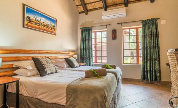 A bedroom at Mutsami Private Bush Lodge in Phalaborwa
