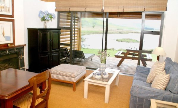 The living room at the Sunset Lodges from Sani Valley Nature Lodges in Himeville