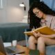 A woman completing an online CompTIA Cloud+ CV0-002 course from Skill Up
