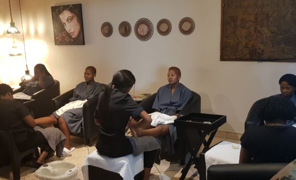 Women getting pedicures at All Wellness Spa in Capital Park