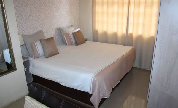 The bedroom at Heaven on Earth Guesthouse and Spa in Musgrave