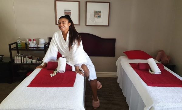 A woman enjoying a massage at Reflections Day Spa in Cape Town City Centre