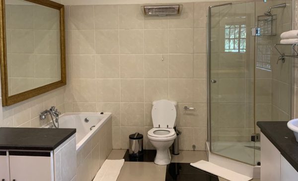 The bathroom at Shades of Summer Boutique Hotel in Centurion
