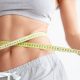 A stock photo of a woman after having an ultrasonic cavitation treatment