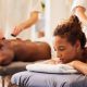 A stock photo of a couple enjoying a massage together