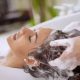 A stock photo of a woman having her washed at a hair salon
