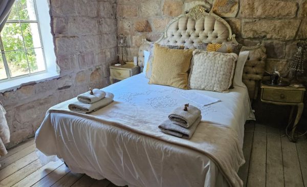 The bedroom at Love Story Guesthouse in Paul Roux