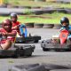 A stock photo of kids during a go-karting session