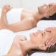 A stock photo of a couple having a massage at the spa
