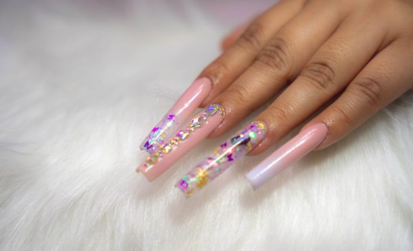 Step up your nail game with a set of acrylics in Alberton
