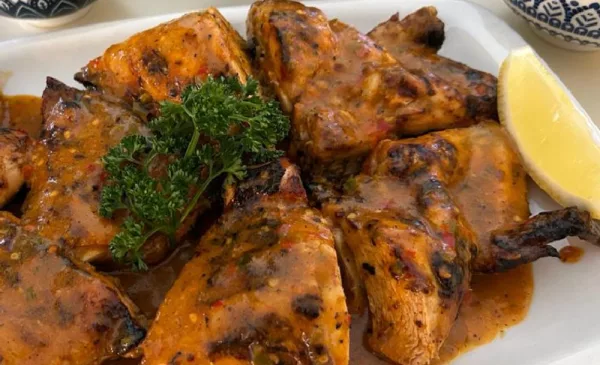 Dig Into Juicy Portuguese Chicken and Seafood - Image 2