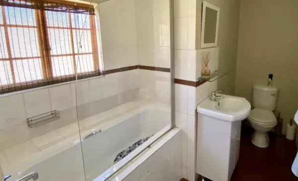 A 1-Night Bed & Breakfast Stay with a Couple's Full-Body Massage - Image 5