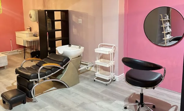 A Sleek Wash, Blow-dry and Flat Iron Treatment - Image 4