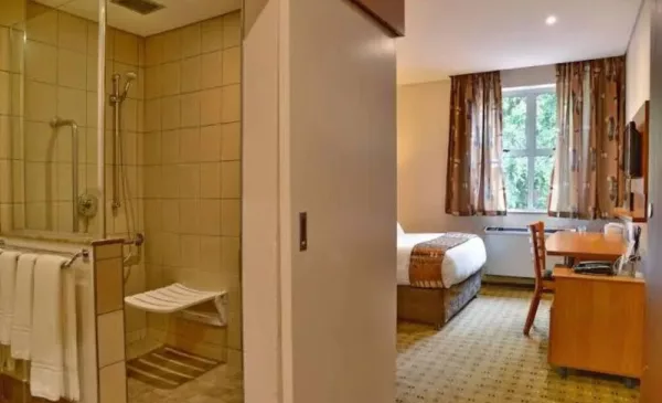 Experience Relaxation and Comfort with a 1-Night Stay that Includes a Full-Body Massage - Image 3